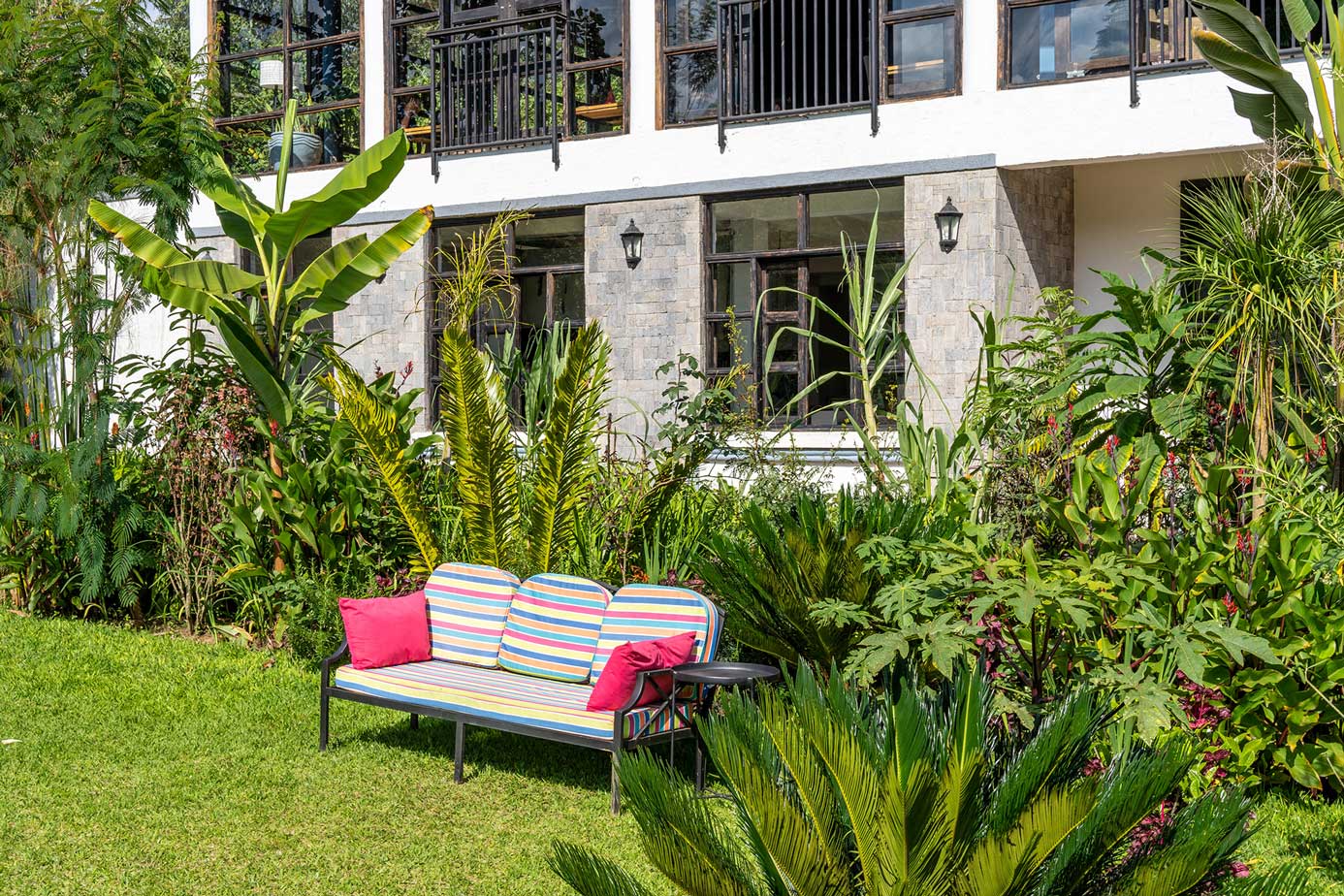 The gardens and lodge buildings at Five Volcanoes Boutique Hotel